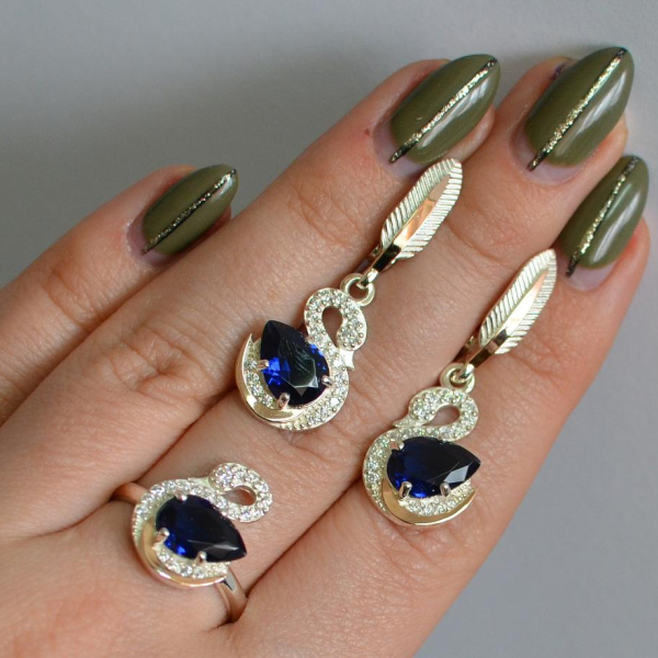 Срібний набір з золотими пластинами