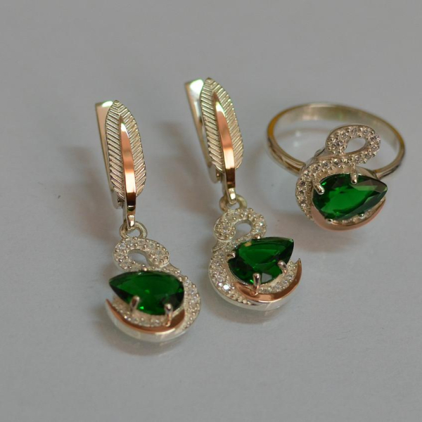 Срібний набір з золотими пластинами