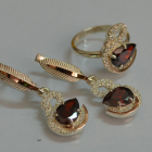 Срібний набір з золотими пластинами