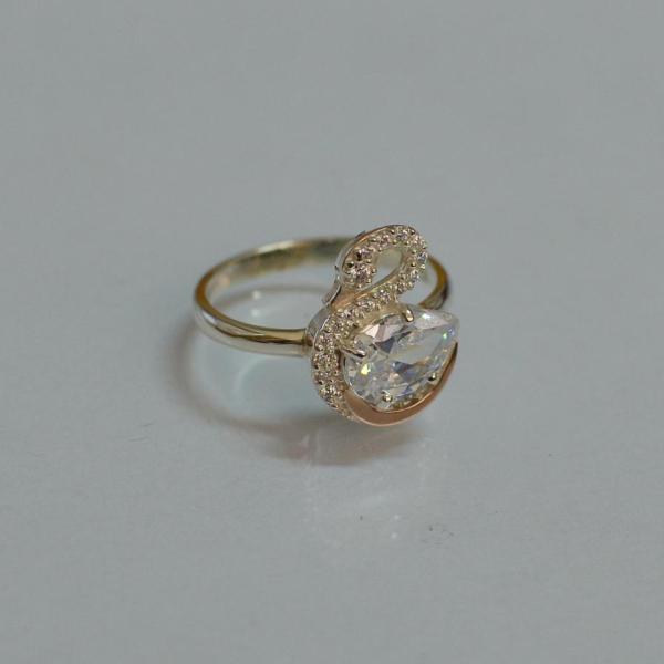 Срібна каблучка з золотими вставками