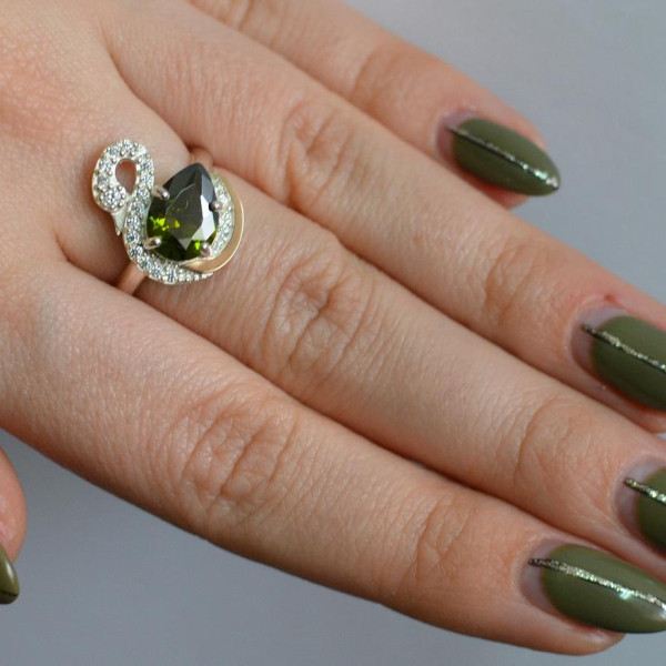 Срібна каблучка з золотими вставками