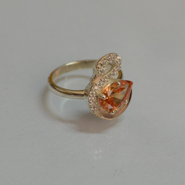 Срібна каблучка з золотими вставками