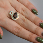 Срібна каблучка з золотими вставками