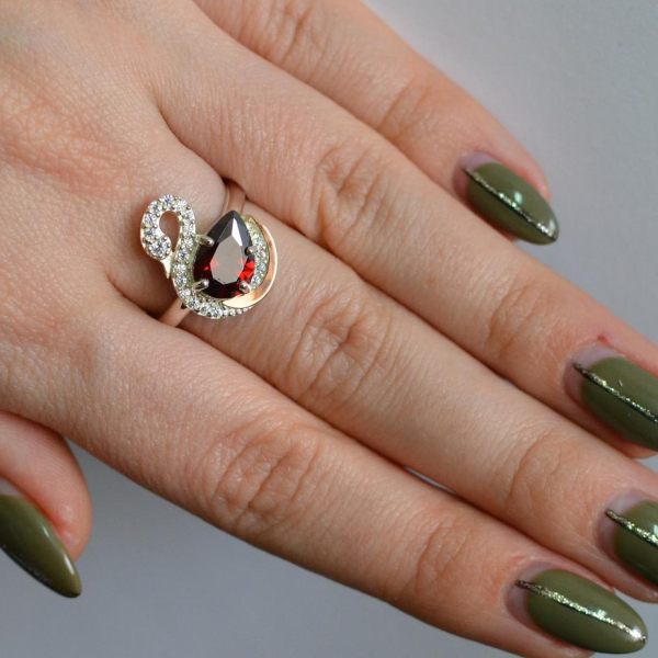 Срібна каблучка з золотими вставками