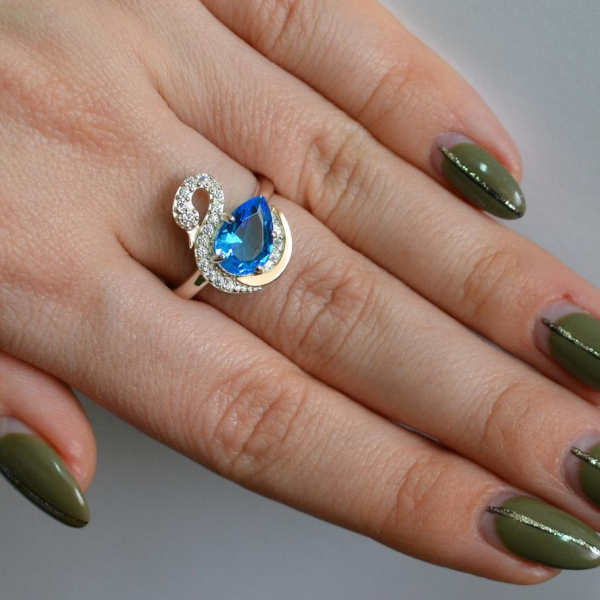 Срібна каблучка з золотими вставками