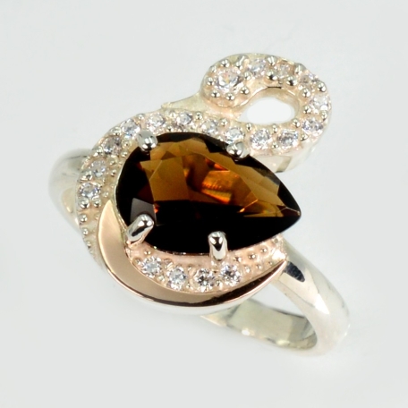 Срібна каблучка з золотими вставками