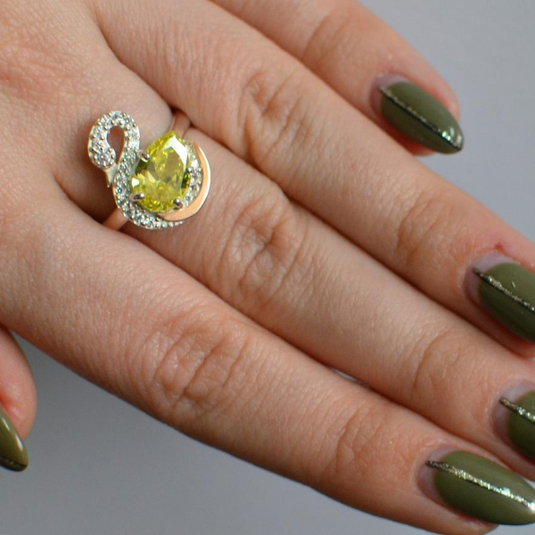 Срібна каблучка з золотими вставками