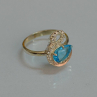 Срібна каблучка з золотими вставками