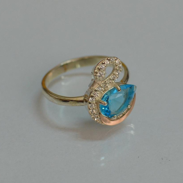 Срібна каблучка з золотими вставками