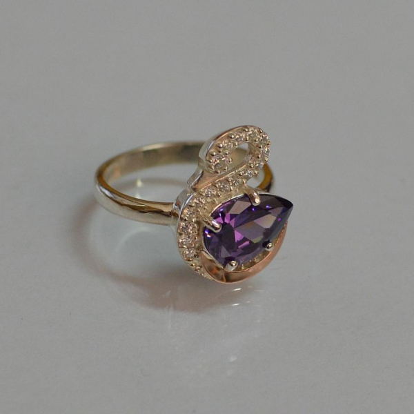 Срібна каблучка з золотими вставками