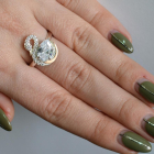 Срібна каблучка з золотими вставками