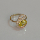 Срібна каблучка з золотими вставками