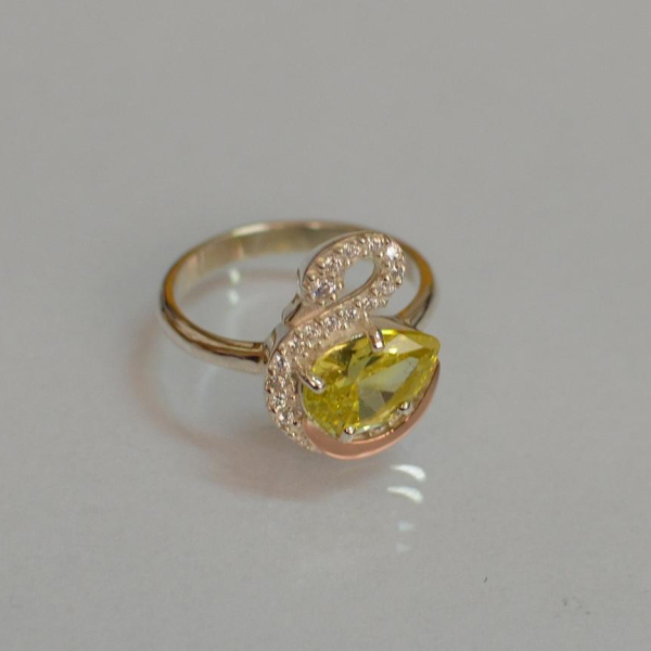 Срібна каблучка з золотими вставками