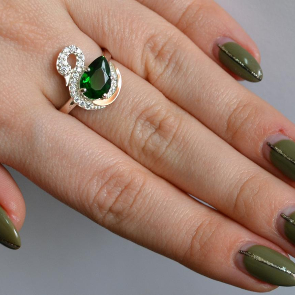 Срібна каблучка з золотими вставками