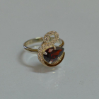 Срібна каблучка з золотими вставками