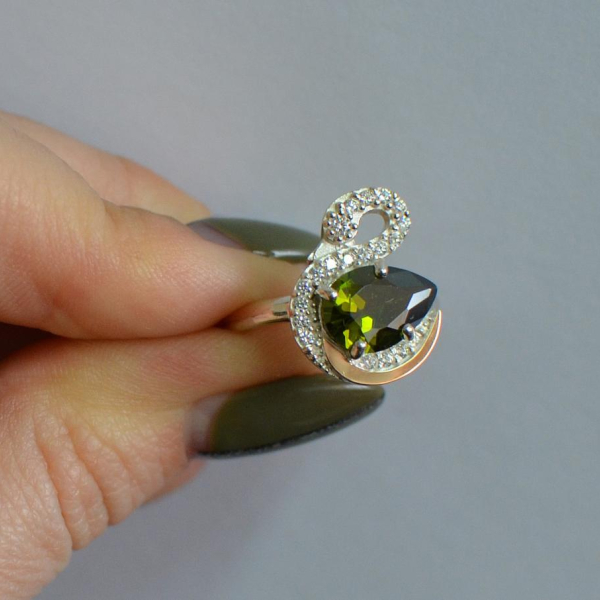 Срібна каблучка з золотими вставками