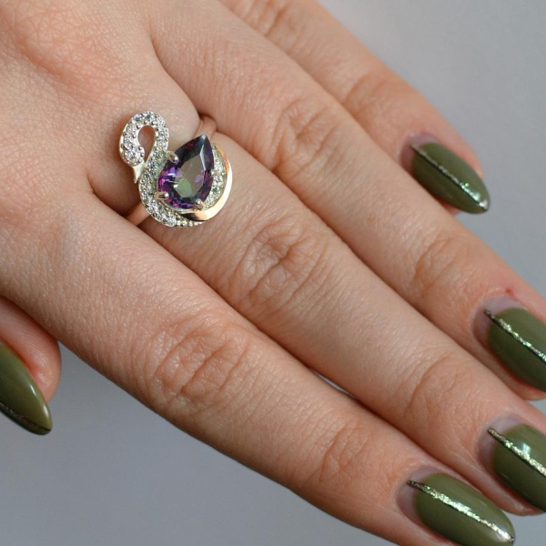 Срібна каблучка з золотими вставками