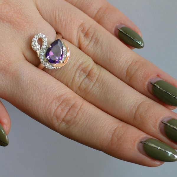 Срібна каблучка з золотими вставками