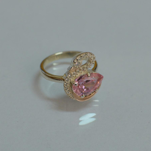 Срібна каблучка з золотими вставками