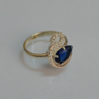 Срібна каблучка з золотими вставками