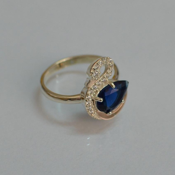 Срібна каблучка з золотими вставками