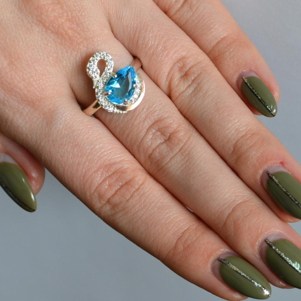 Срібна каблучка з золотими вставками