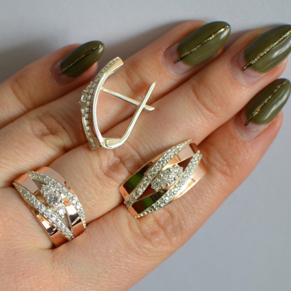 Срібний набір з золотими пластинами