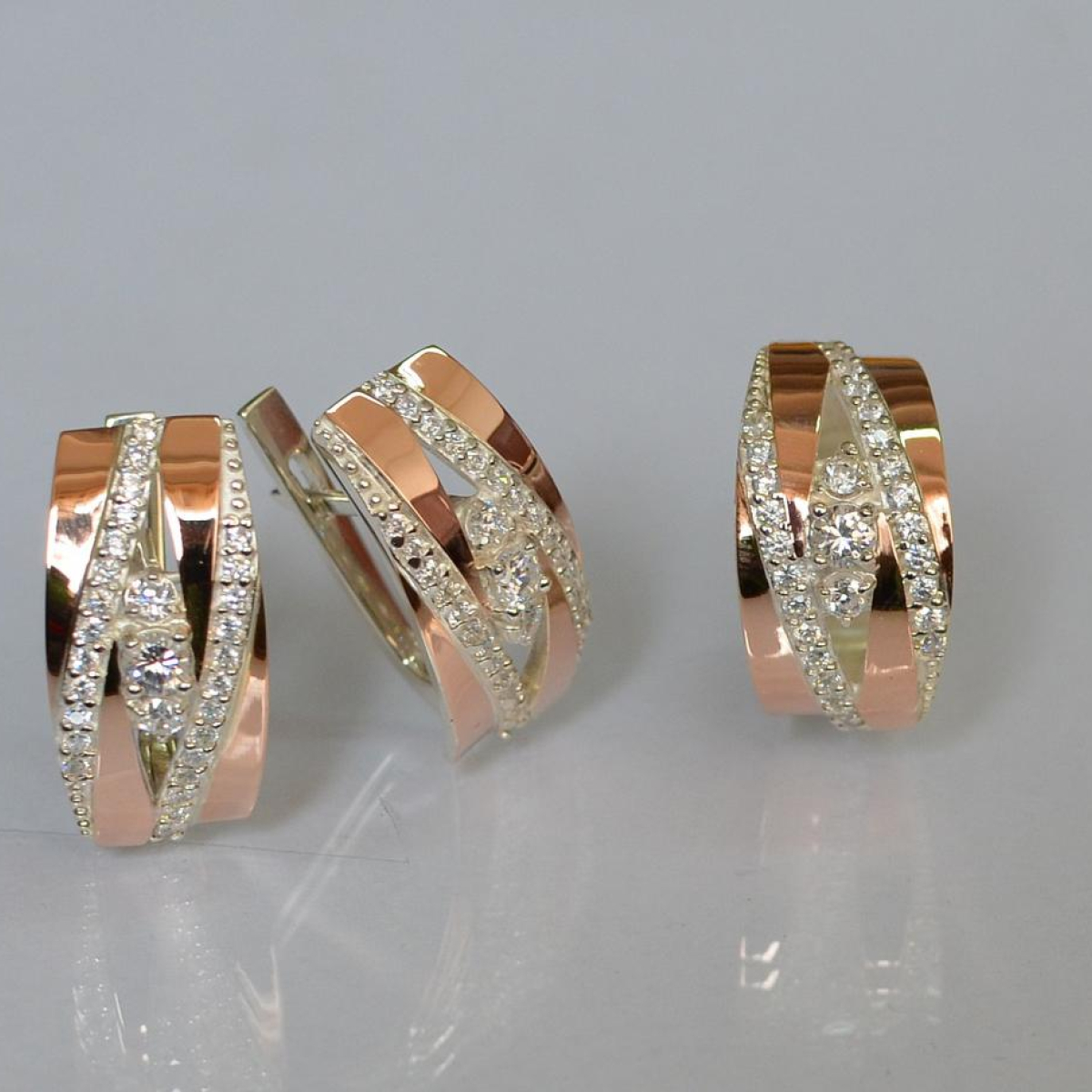 Срібний набір з золотими пластинами