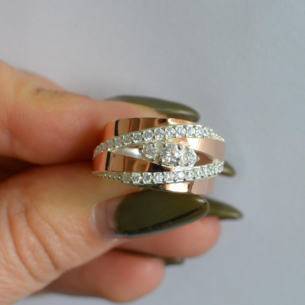 Срібна каблучка з золотими вставками