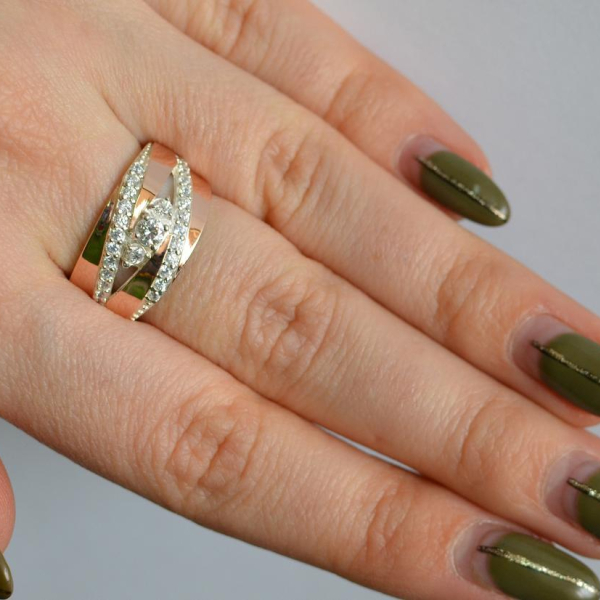 Срібна каблучка з золотими вставками