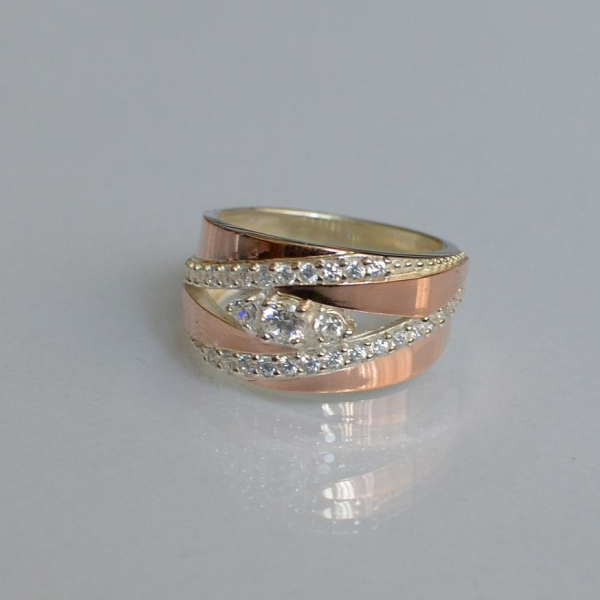 Срібна каблучка з золотими вставками