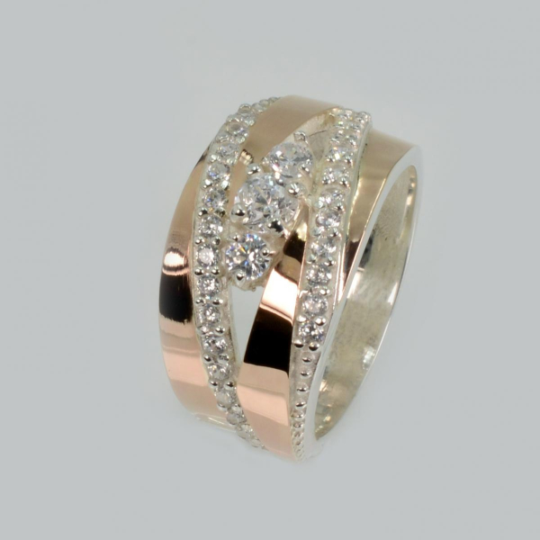 Срібна каблучка з золотими вставками