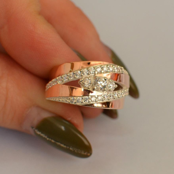 Срібна каблучка з золотими вставками