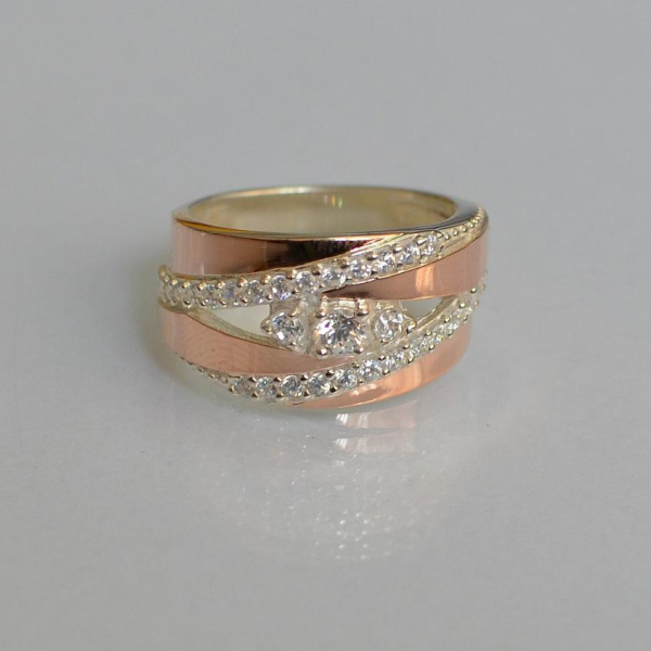 Срібна каблучка з золотими вставками