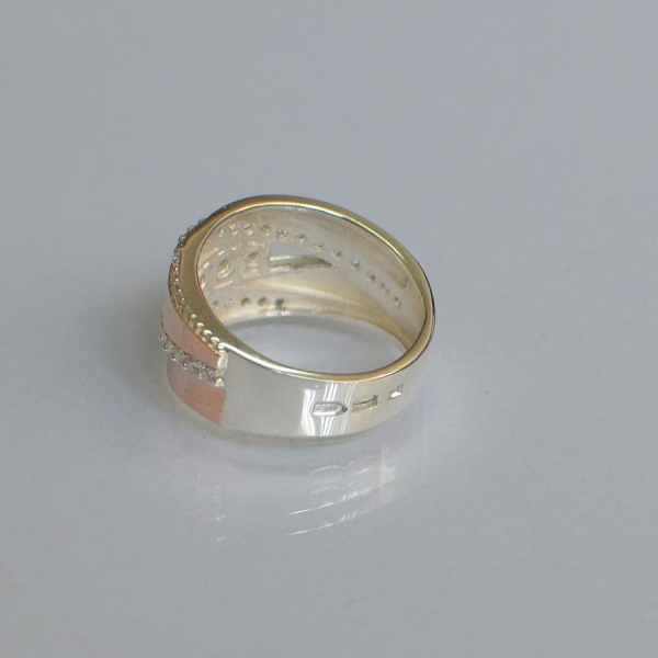 Срібна каблучка з золотими вставками