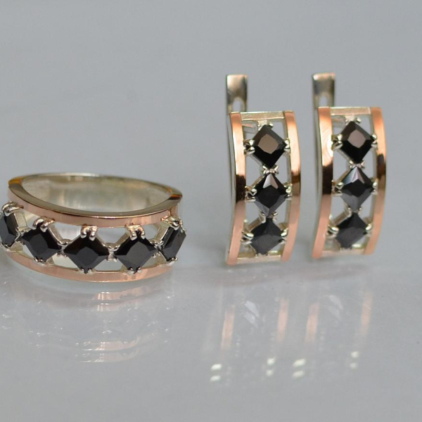 Срібний набір з золотими пластинами