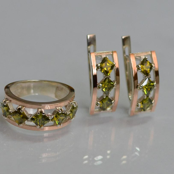 Срібний набір з золотими пластинами