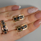 Срібний набір з золотими пластинами