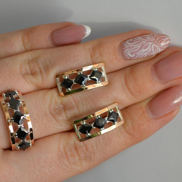 Срібний набір з золотими пластинами