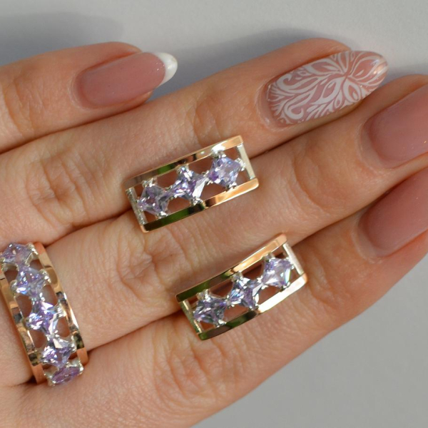 Срібний набір з золотими пластинами