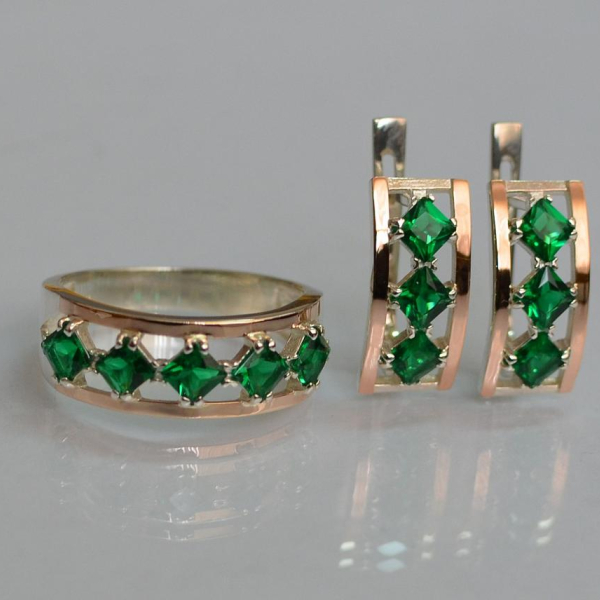 Срібний набір з золотими пластинами