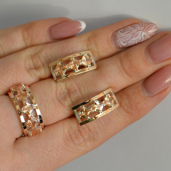 Срібний набір з золотими пластинами