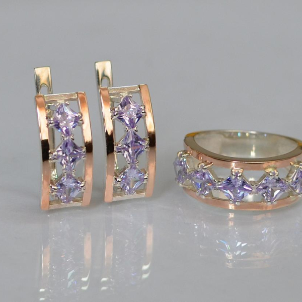 Срібний набір з золотими пластинами