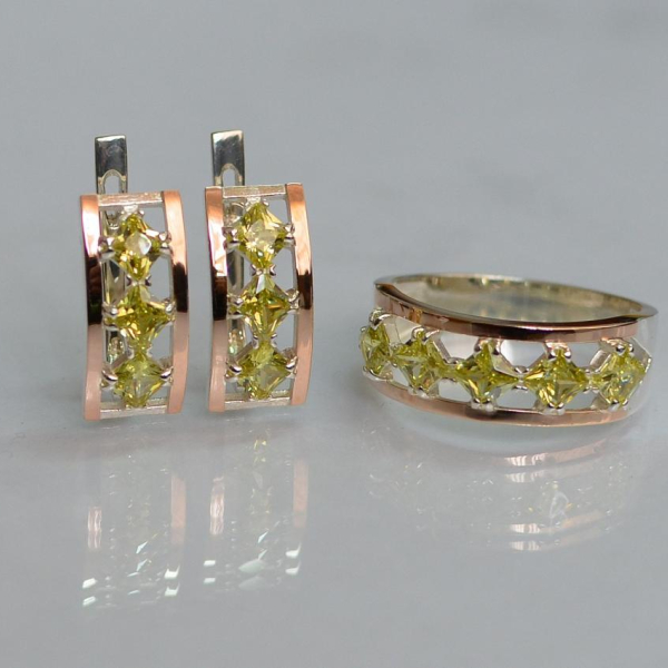 Срібний набір з золотими пластинами