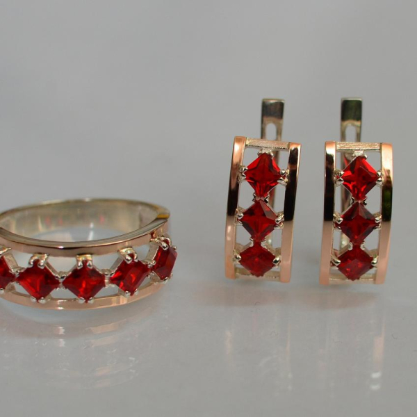 Срібний набір з золотими пластинами