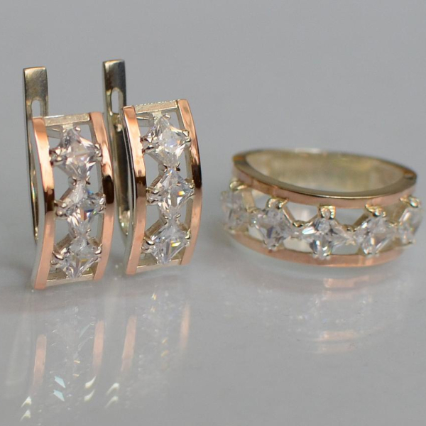 Срібний набір з золотими пластинами