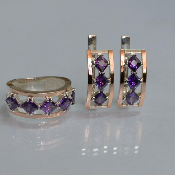 Срібний набір з золотими пластинами