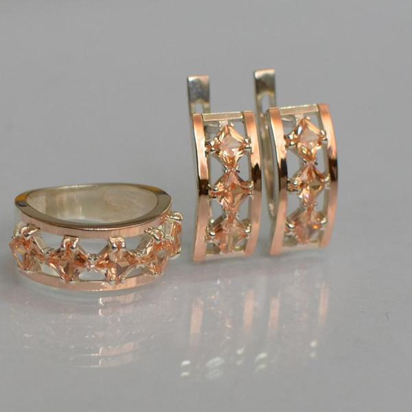 Срібний набір з золотими пластинами