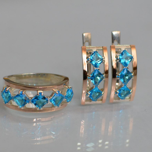 Срібний набір з золотими пластинами