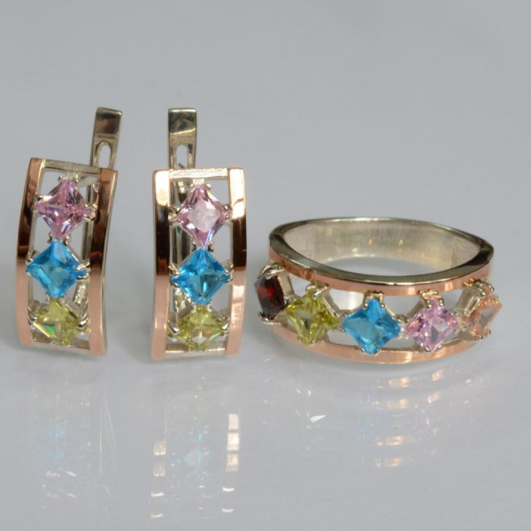 Срібний набір з золотими пластинами